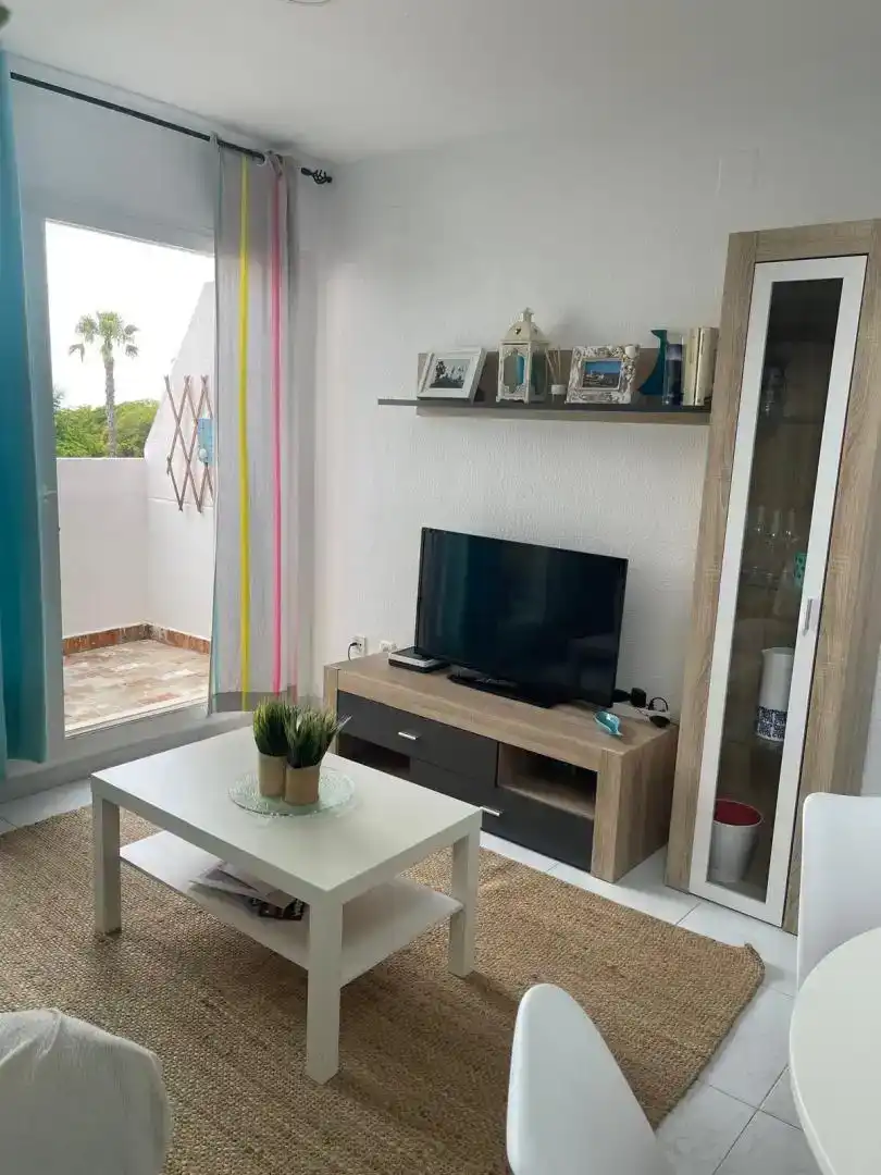 Wohnzimmer von Maisonette zur Miete in El Rompido mit Schwimmbad und Balkon