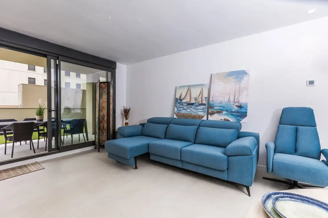 Sala de estar de Apartamento de alquiler en Dénia con Aire acondicionado, Jardín privado y Terraza