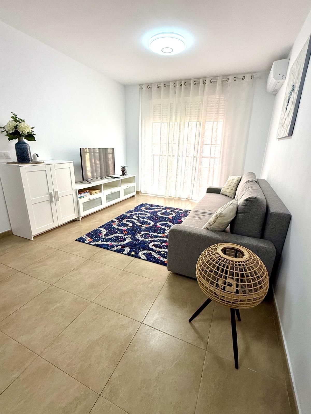 Living room of Flat for sale in Torrent  with Air Conditioner, Terrace and Furnished