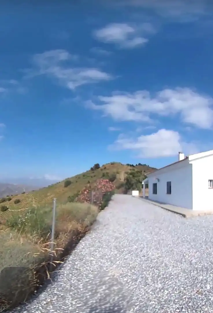 Vista exterior de Finca rústica en venda en El Borge amb Jardí privat, Terrassa i Traster