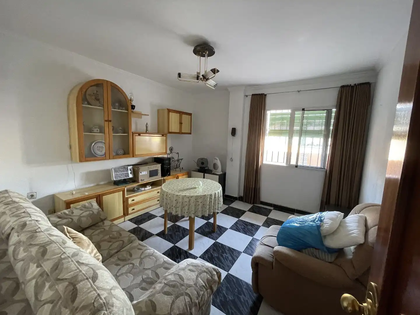 Sala d'estar de Casa adosada en venda en Málaga