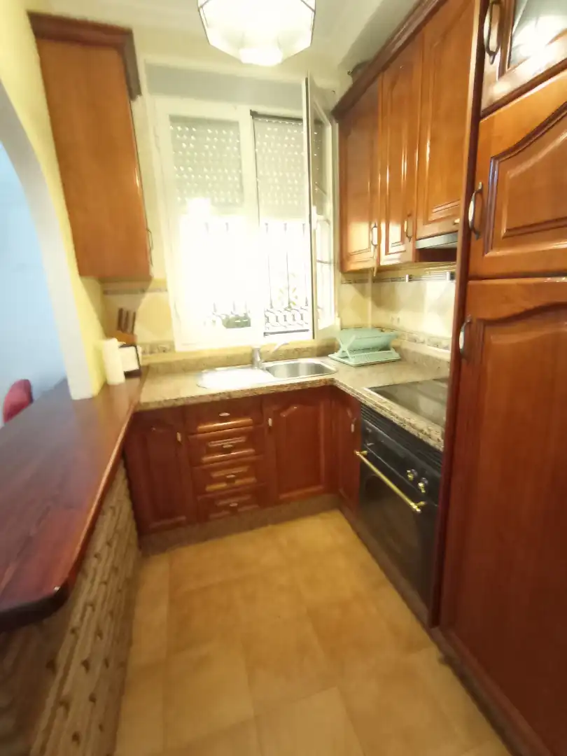 Cuina de Apartament de lloguer en Málaga amb Aire condicionat, Terrassa i Moblat
