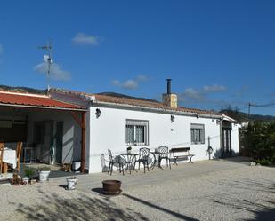 Vista exterior de Casa o xalet en venda en Onil amb Jardí privat, Piscina i Forn