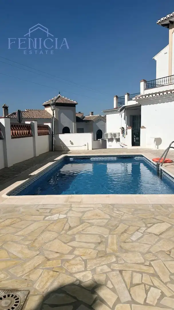 Piscina de Casa adosada en venta en Nerja con Jardín privado, Terraza y Piscina comunitaria