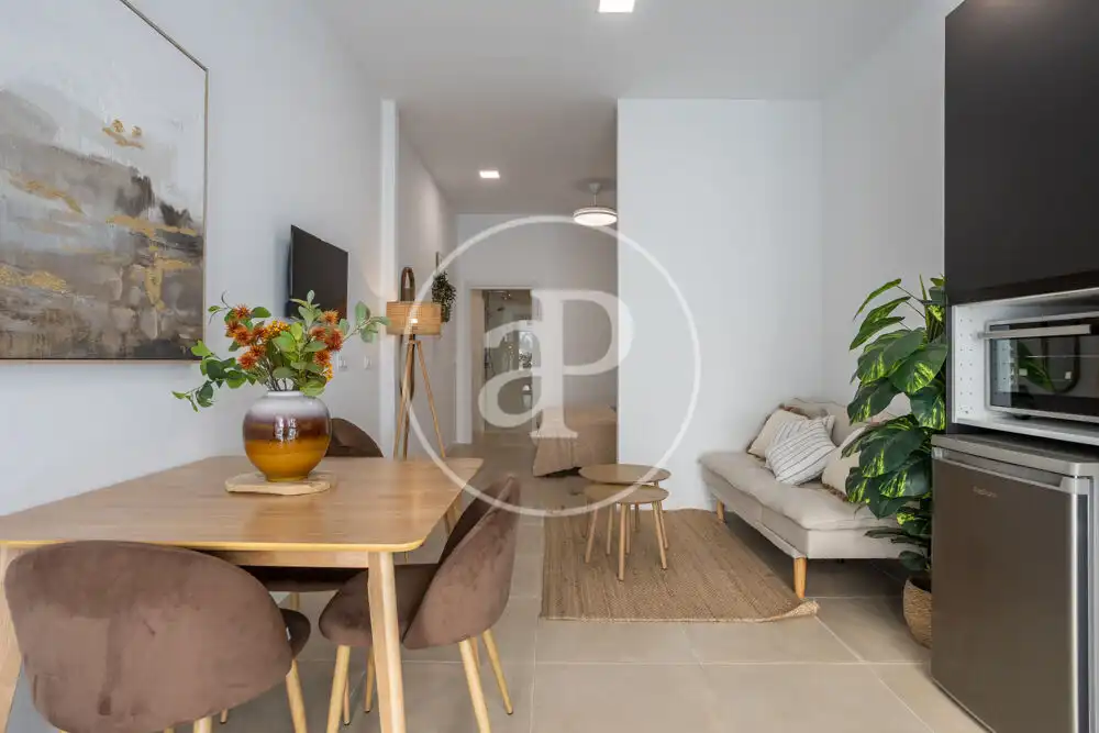 Sala d'estar de Loft de lloguer en Valencia amb Aire condicionat i Moblat
