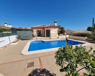 Vista exterior de Casa o xalet en venda en Arboleas amb Aire condicionat, Terrassa i Piscina