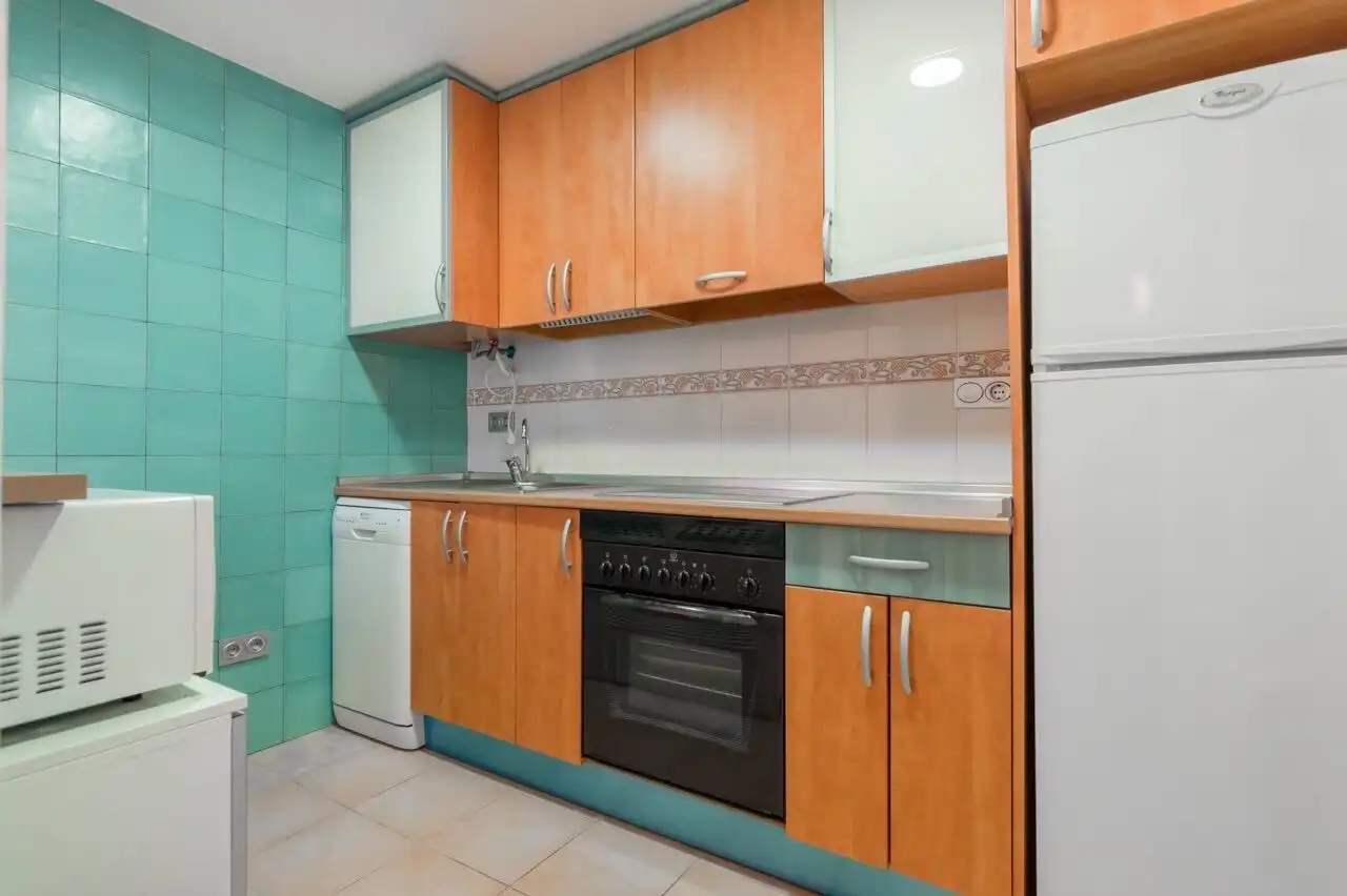 Cuina de Apartament de lloguer en La Manga del Mar Menor amb Aire condicionat, Calefacció i Piscina