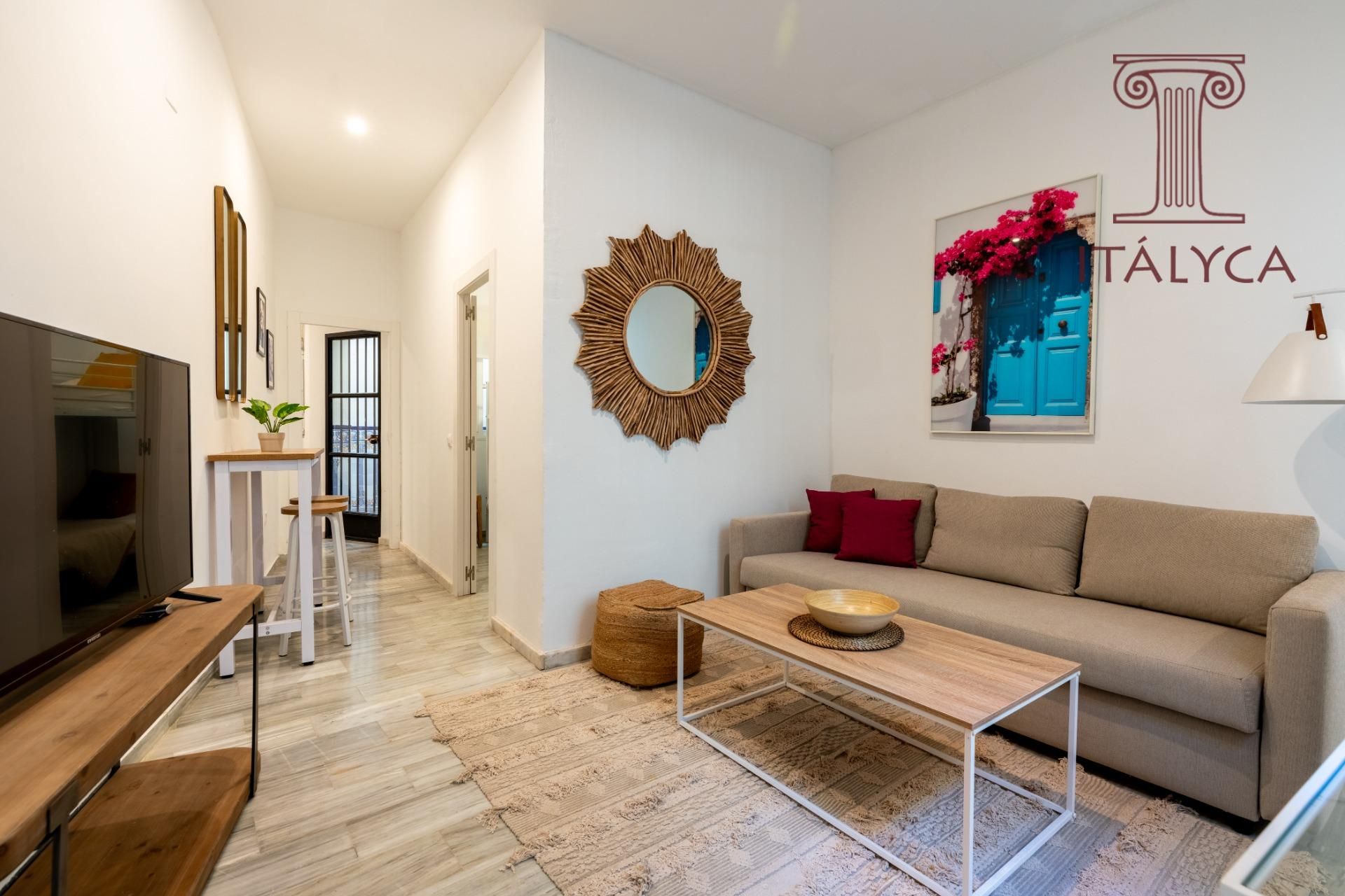 Living room of Flat for sale in  Sevilla Capital  with Air Conditioner, Furnished and Alarm