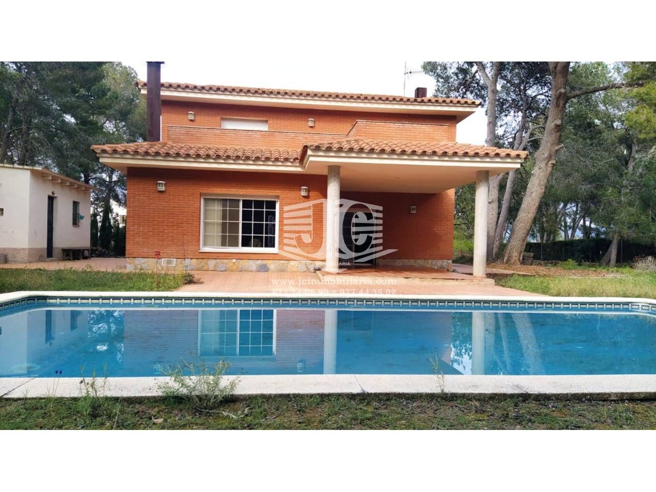 Jardí de Casa o xalet de lloguer en Roquetes amb Aire condicionat, Terrassa i Piscina