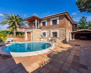 Exterior view of House or chalet for sale in Pozuelo de Alarcón  with Swimming Pool