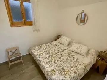 Schlafzimmer von Erdgeschoss zur Miete in Es Mercadal mit Klimaanlage, Heizung und Terrasse
