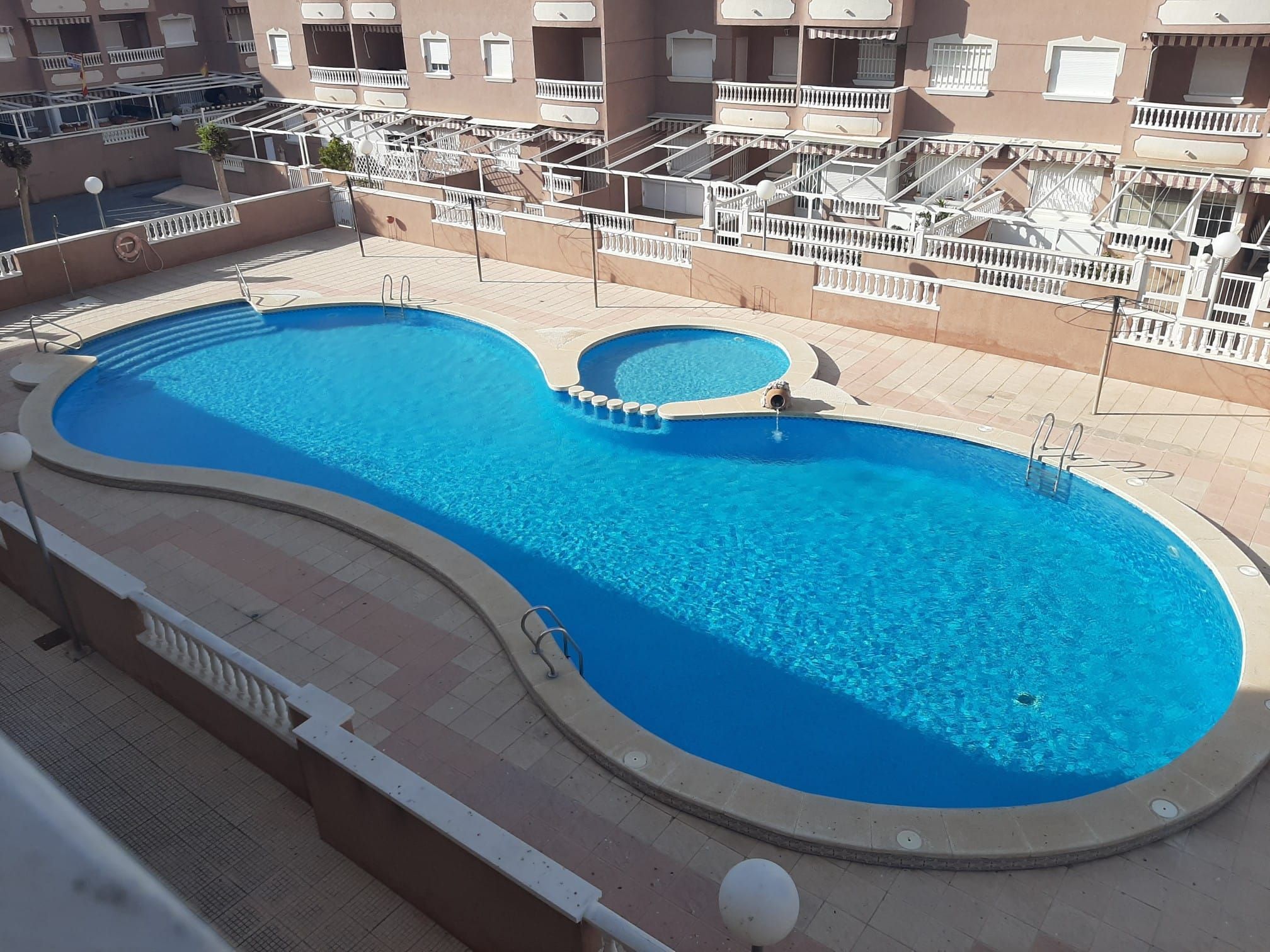 Piscina de Apartamento de alquiler en Santa Pola con Terraza, Amueblado y Piscina comunitaria