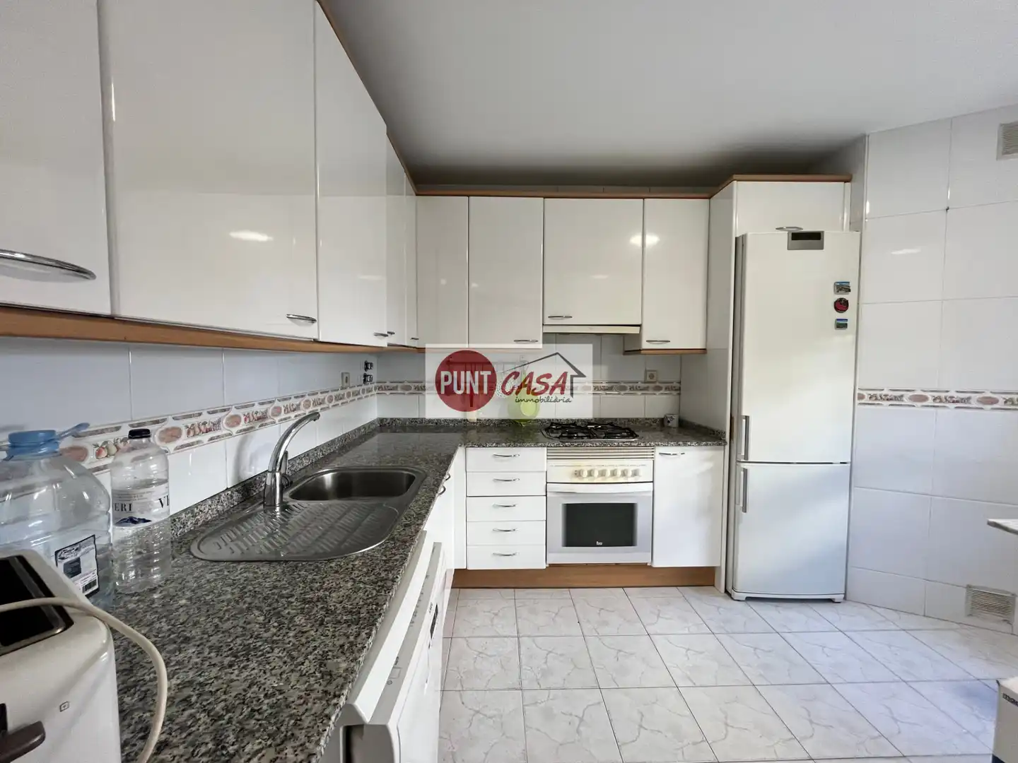 Cuina de Casa adosada en venda en Benavent de Segrià amb Aire condicionat, Calefacció i Jardí privat
