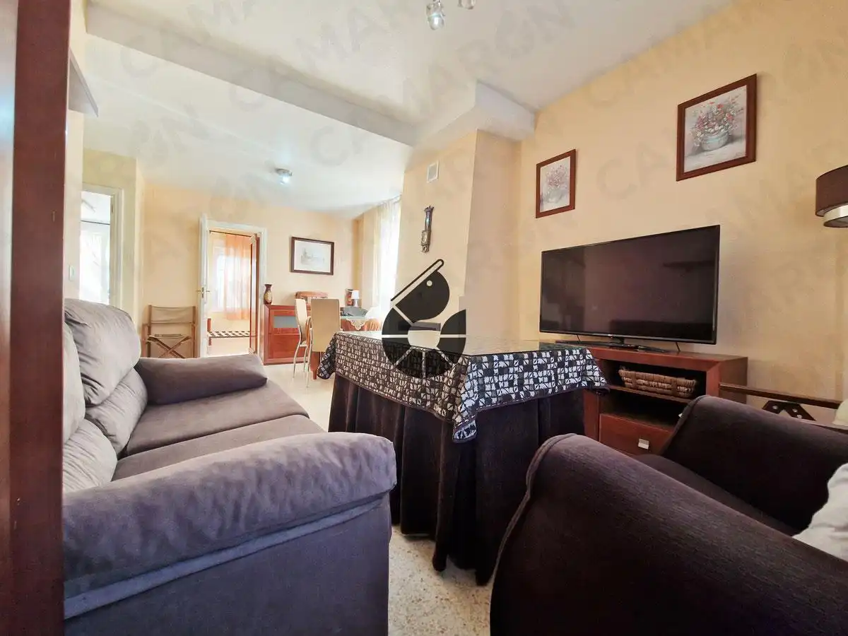 Sala de estar de Casa adosada en venta en Coria del Río con Terraza