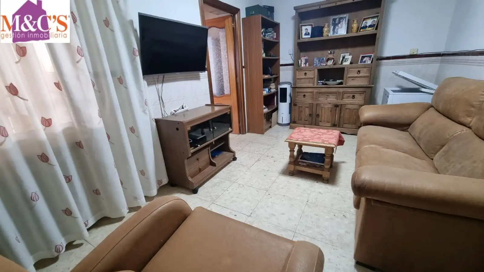 Sala d'estar de Casa o xalet en venda en Puertollano amb Aire condicionat, Terrassa i Traster