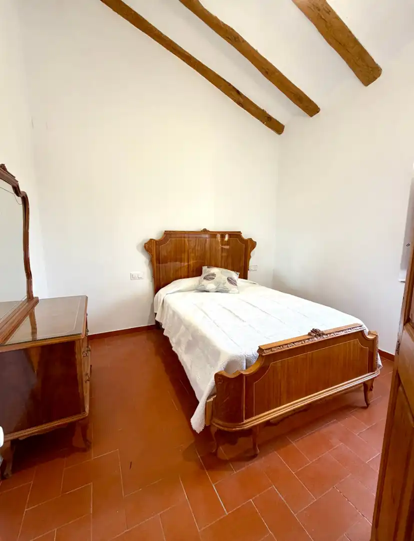 Dormitori de Finca rústica de lloguer en Canyelles amb Aire condicionat, Calefacció i Jardí privat