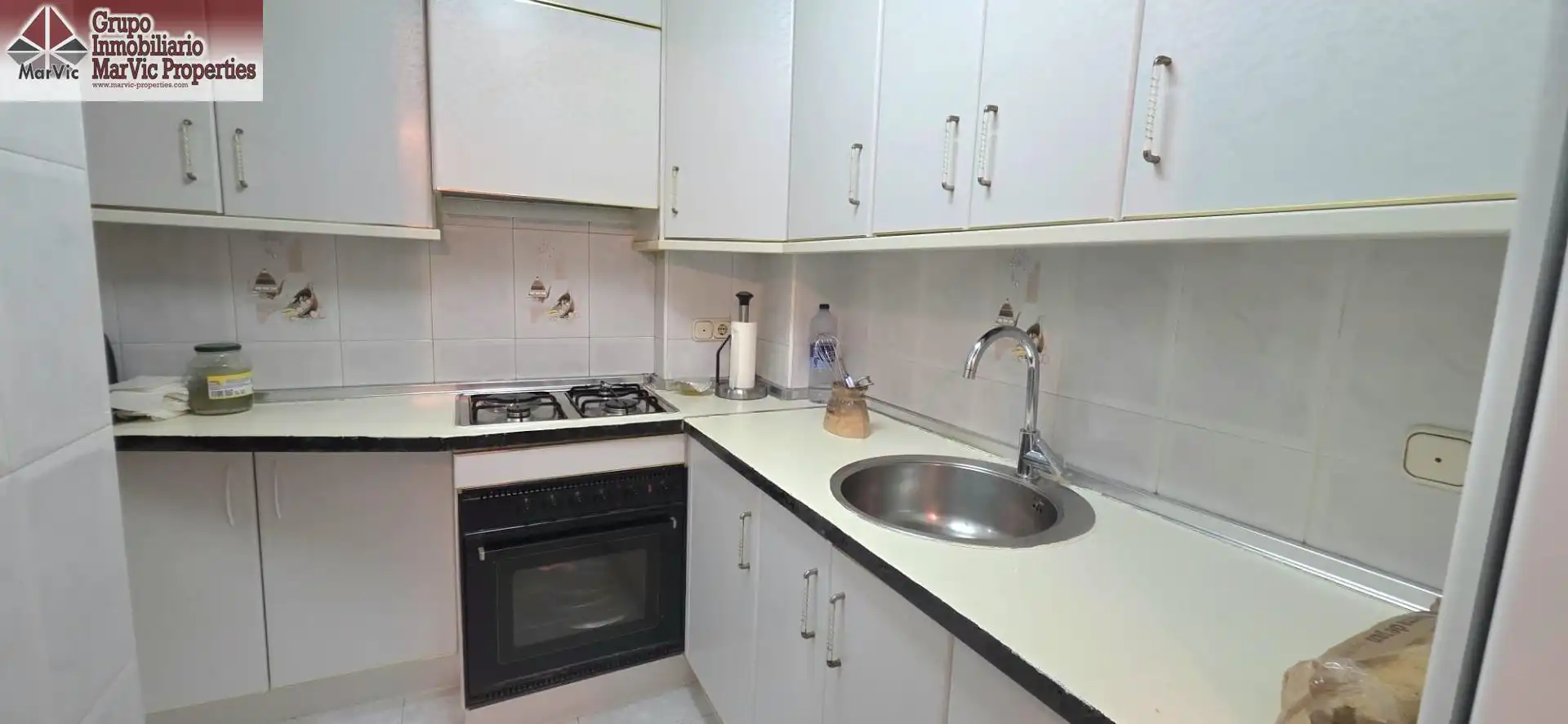 Cocina de Apartamento en venta en Benidorm con Aire acondicionado, Jardín privado y Amueblado