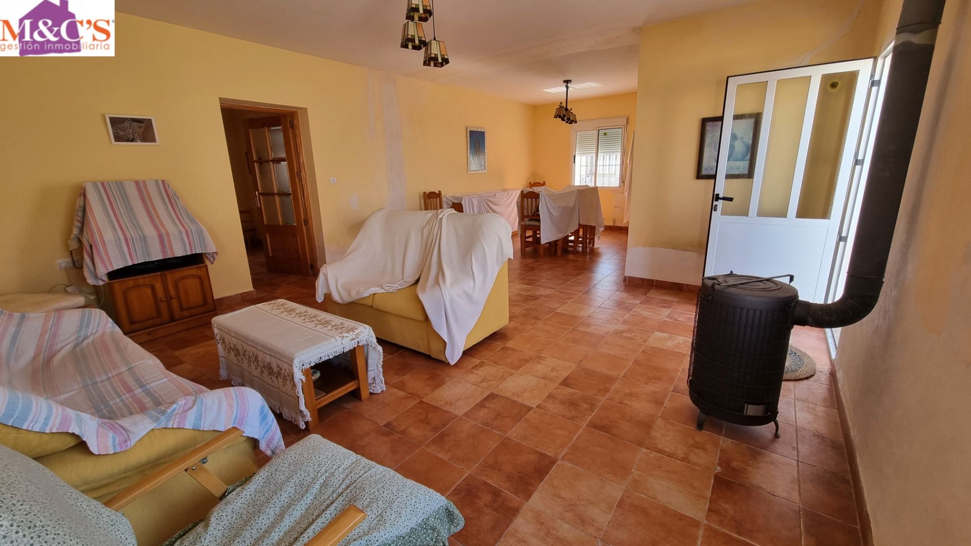 Sala d'estar de Casa o xalet en venda en Villanueva de San Carlos