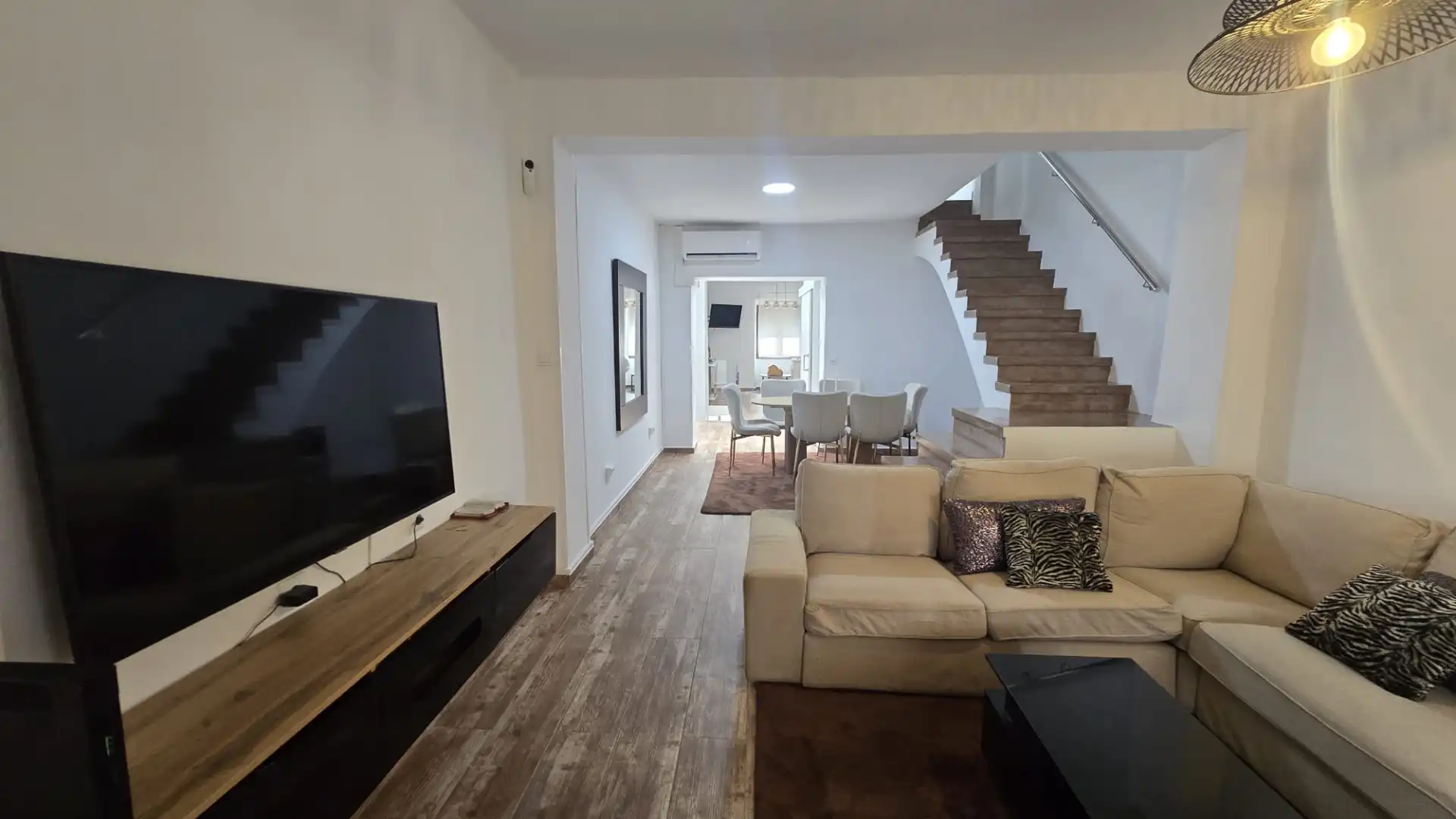 Sala d'estar de Casa adosada de lloguer en Oliva amb Aire condicionat, Moblat i Forn