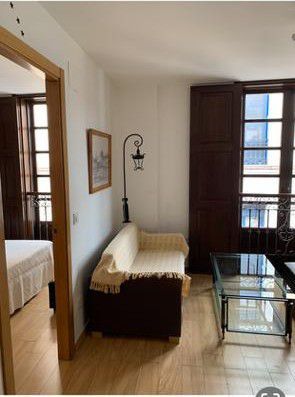 Dormitori de Apartament de lloguer en Grado amb Balcó
