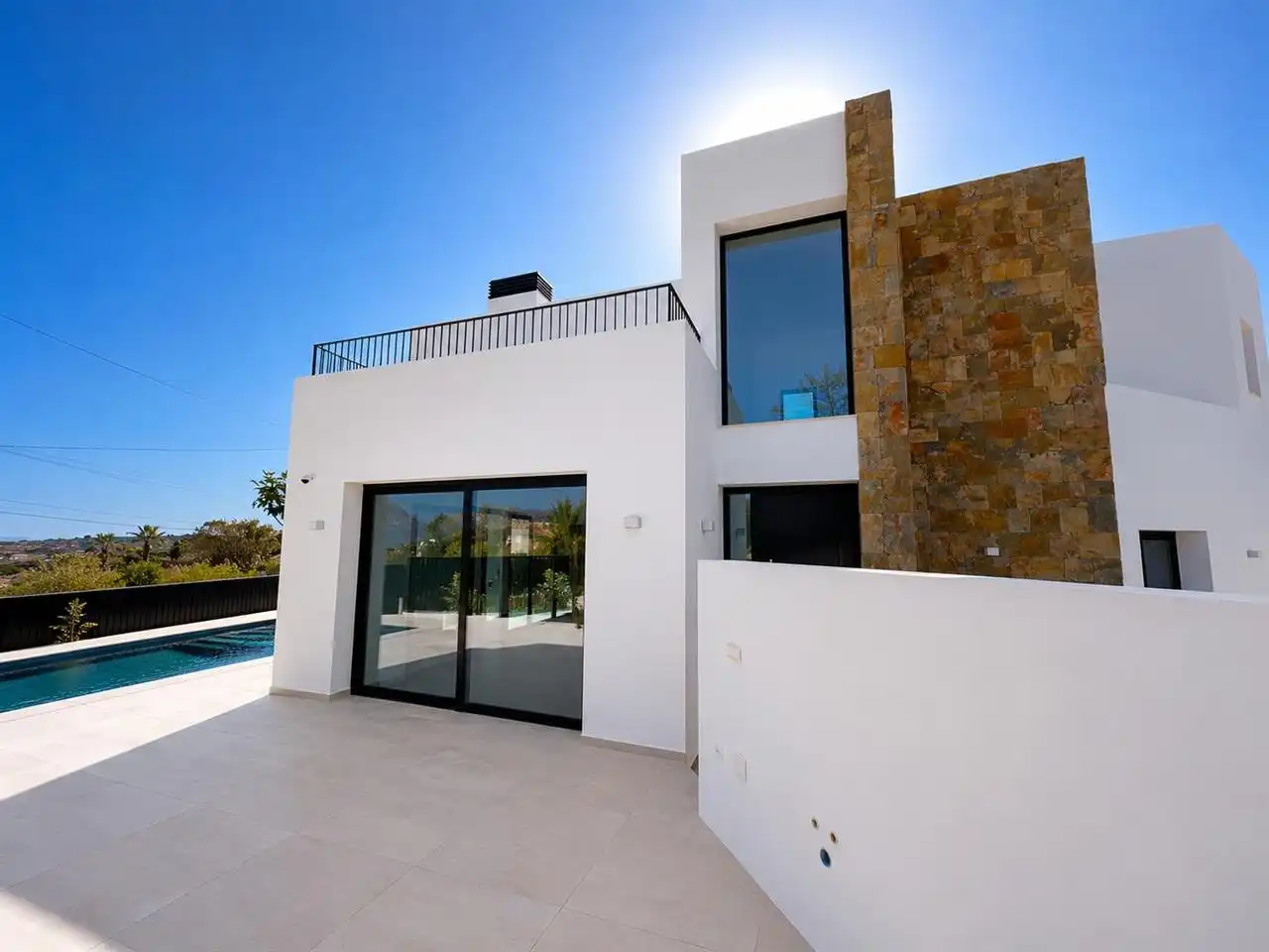 Vista exterior de Casa adosada en venda en L'Alfàs del Pi amb Aire condicionat, Jardí privat i Traster