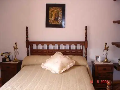 Dormitori de Casa o xalet en venda en El Cuervo amb Calefacció, Parquet i Moblat