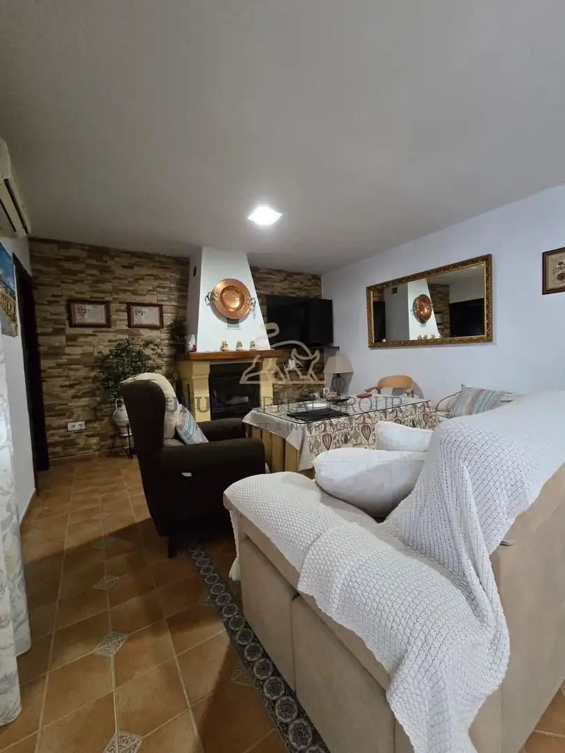 Sala de estar de Casa adosada en venta en La Victoria con Aire acondicionado, Calefacción y Jardín privado