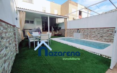 Swimming pool of Single-family semi-detached for sale in Dos Hermanas  with Air Conditioner, Terrace and Storage room