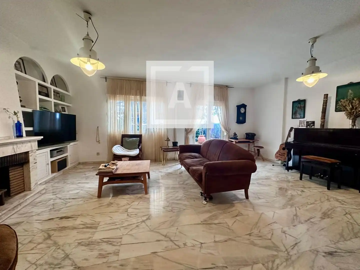 Sala de estar de Casa adosada en venta en Población de Arroyo con Aire acondicionado, Calefacción y Jardín privado