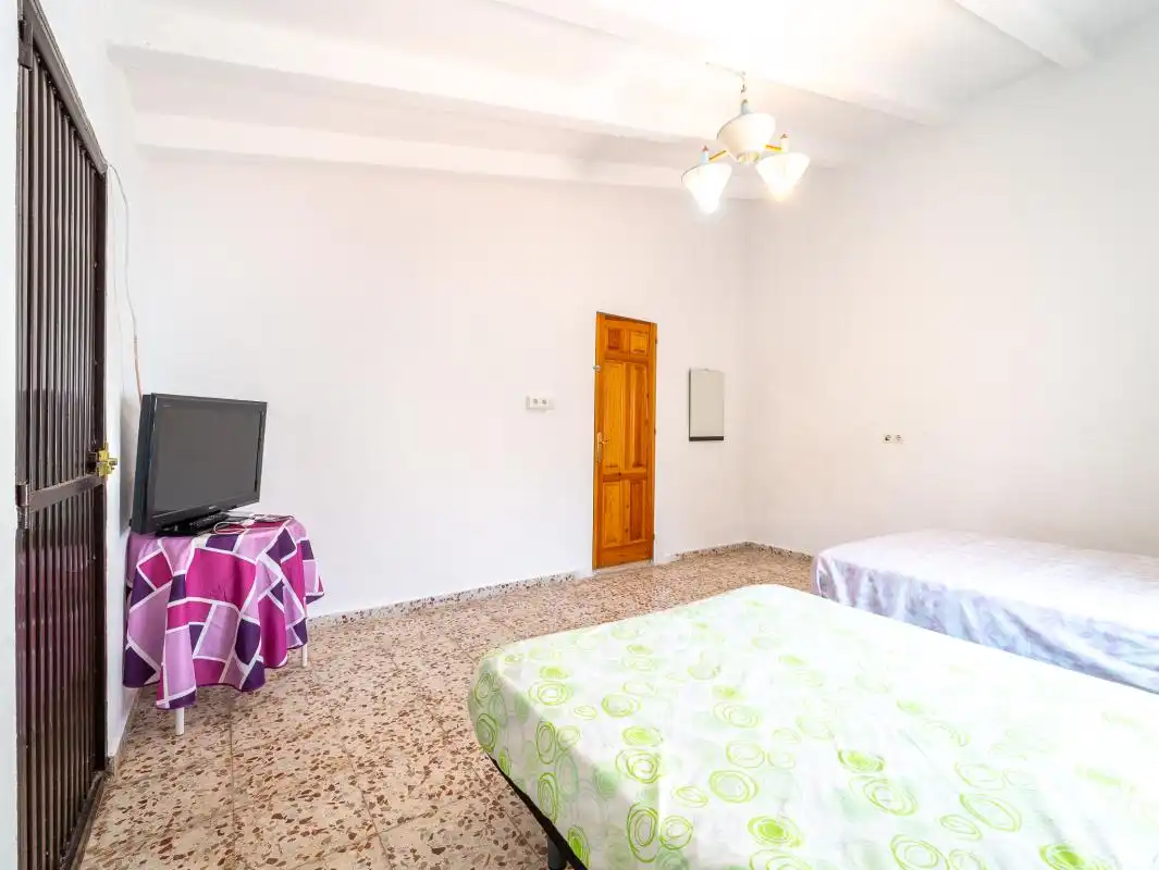 Habitación de Casa adosada en venta en Frigiliana con Aire acondicionado, Calefacción y Jardín privado