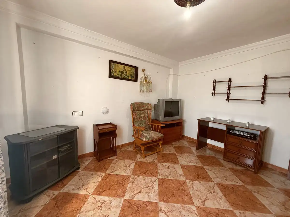 Sala de estar de Casa adosada en venta en Benamejí con Jardín privado, Terraza y Trastero