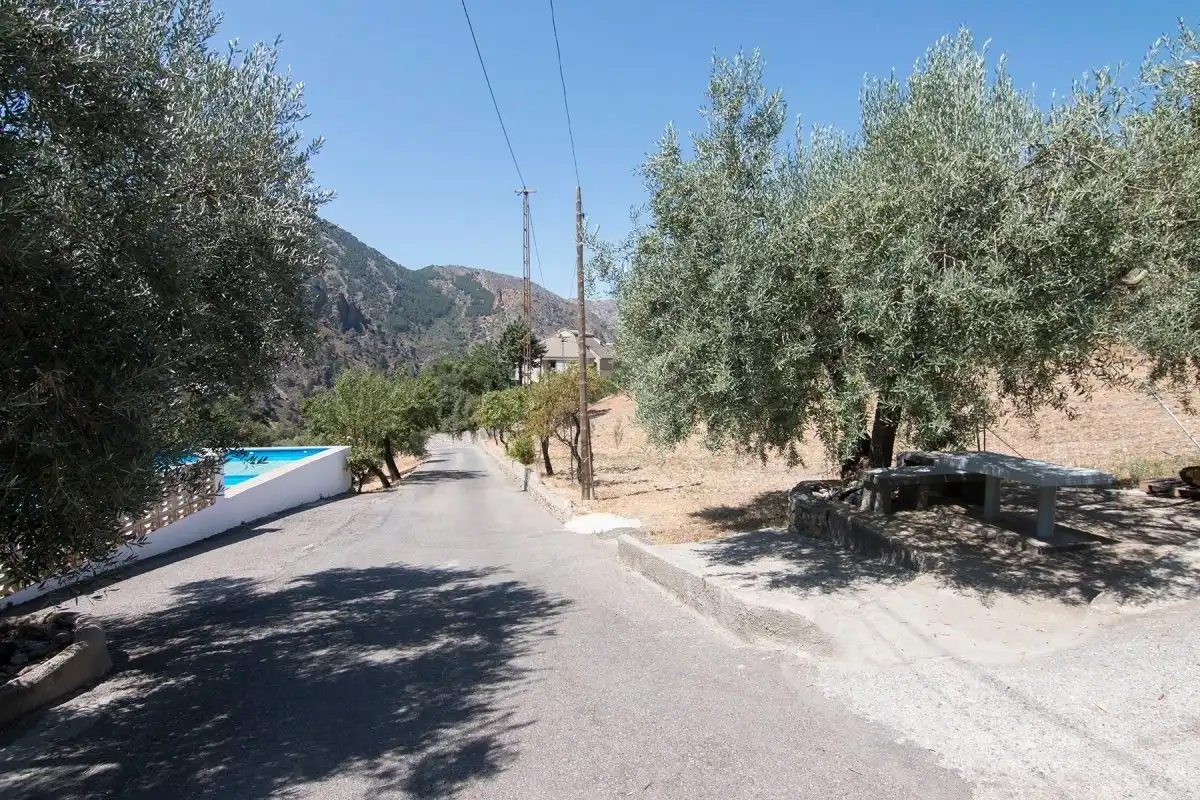 Vista exterior de Finca rústica en venta en Güéjar Sierra con Jardín privado, Terraza y Piscina