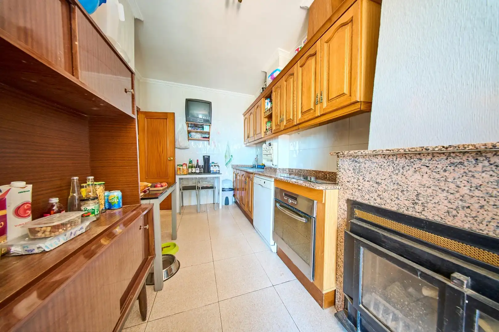 Cocina de Casa adosada en venta en Baza con Calefacción, Terraza y Trastero