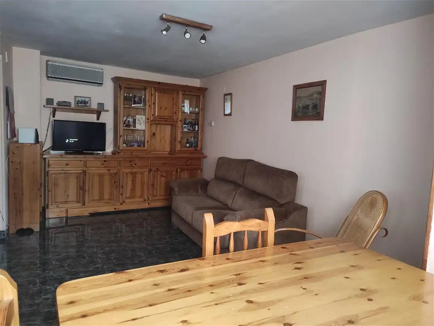 Sala d'estar de Casa adosada en venda en Caspe amb Aire condicionat