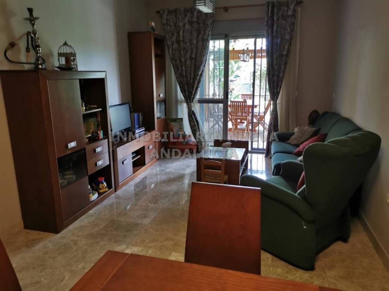 Sala d'estar de Pis de lloguer en  Almería Capital amb Aire condicionat, Jardí privat i Terrassa