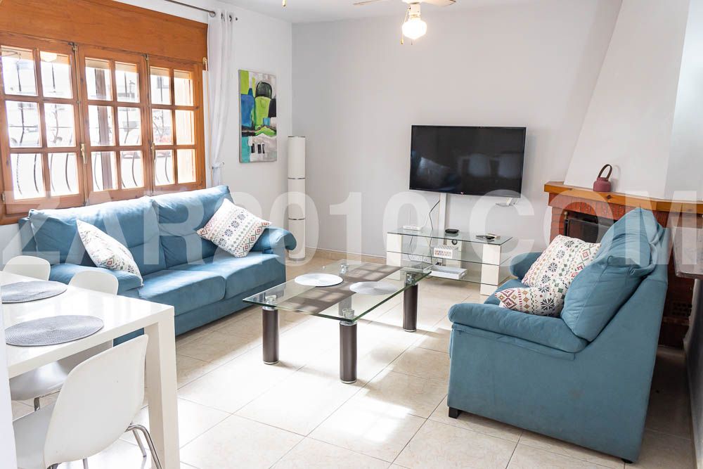 Sala d'estar de Casa adosada en venda en Garrucha amb Terrassa, Forn i Rentadora