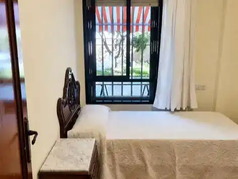 Schlafzimmer von Wohnung zur Miete in Málaga mit Privatgarten und Schwimmbad