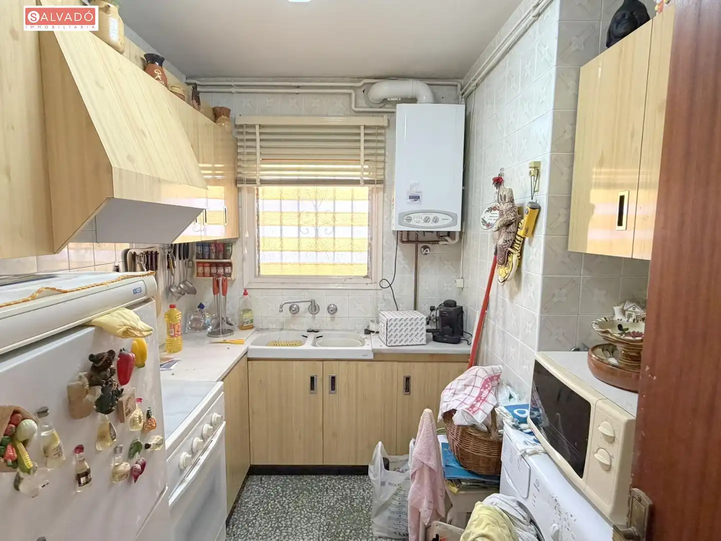 Küche von Erdgeschoss zum Verkauf in Calafell mit Klimaanlage, Heizung und Privatgarten
