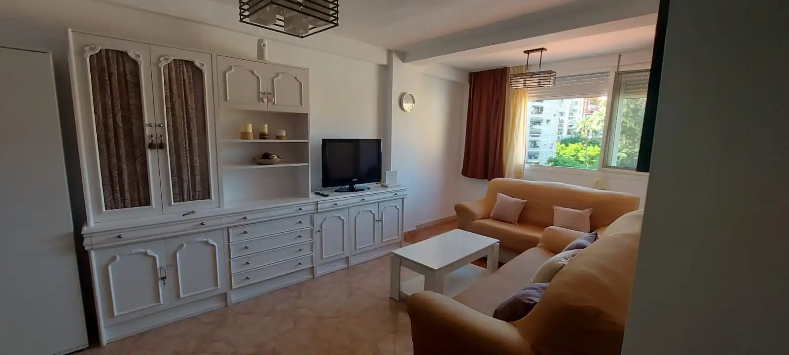 Sala d'estar de Pis de lloguer en Málaga amb Moblat