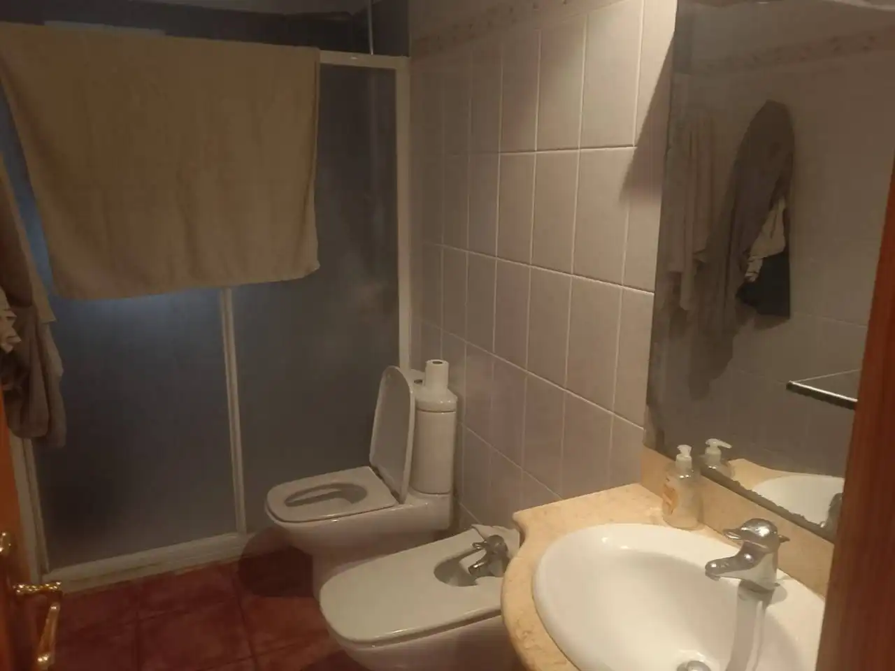 Bany de Casa adosada en venda en Oliva amb Aire condicionat, Calefacció i Jardí privat