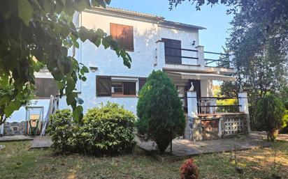 Exterior view of House or chalet for sale in Riells i Viabrea  with Air Conditioner, Heating and Private garden