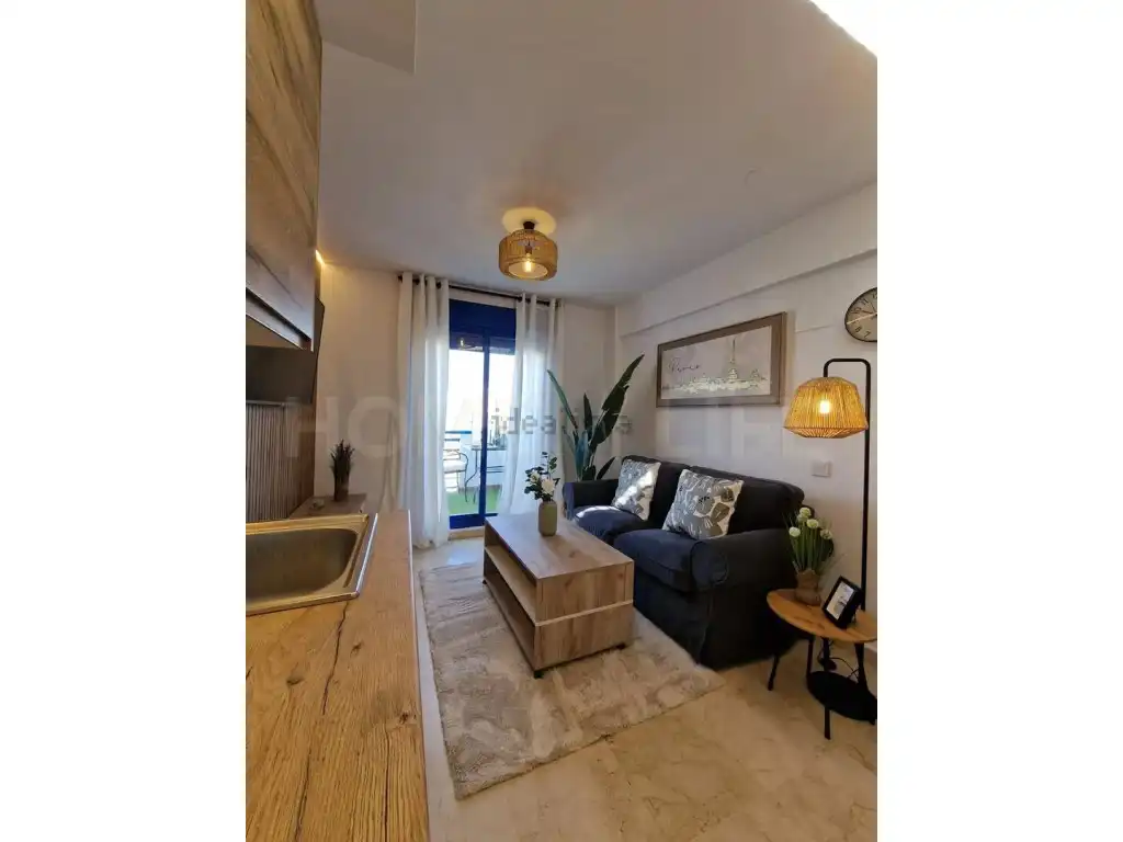 Wohnzimmer von Maisonette zum Verkauf in Benalmádena mit Klimaanlage, Privatgarten und Terrasse