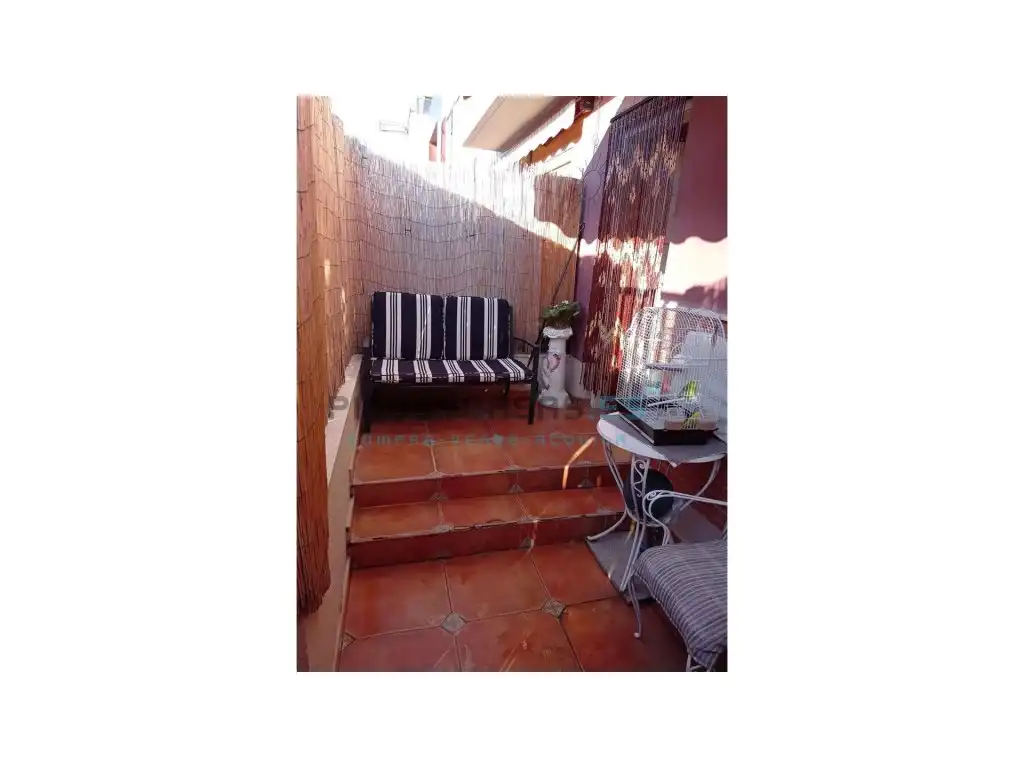 Terrassa de Casa adosada en venda en Sagunto / Sagunt amb Aire condicionat, Jardí privat i Terrassa