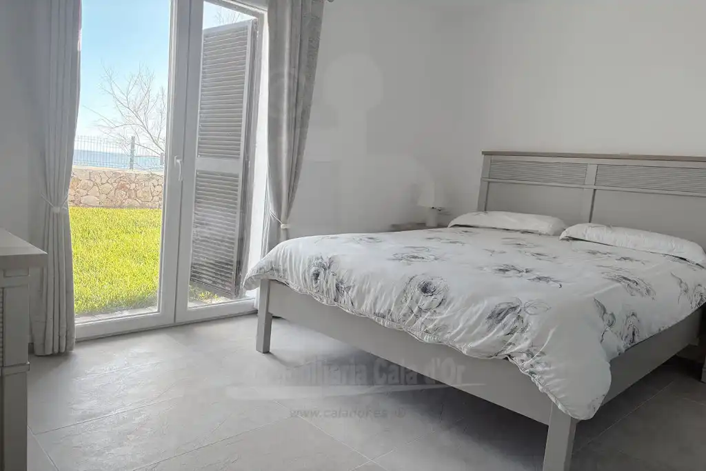 Schlafzimmer von Wohnungen zum Verkauf in Santanyí mit Klimaanlage, Privatgarten und Terrasse