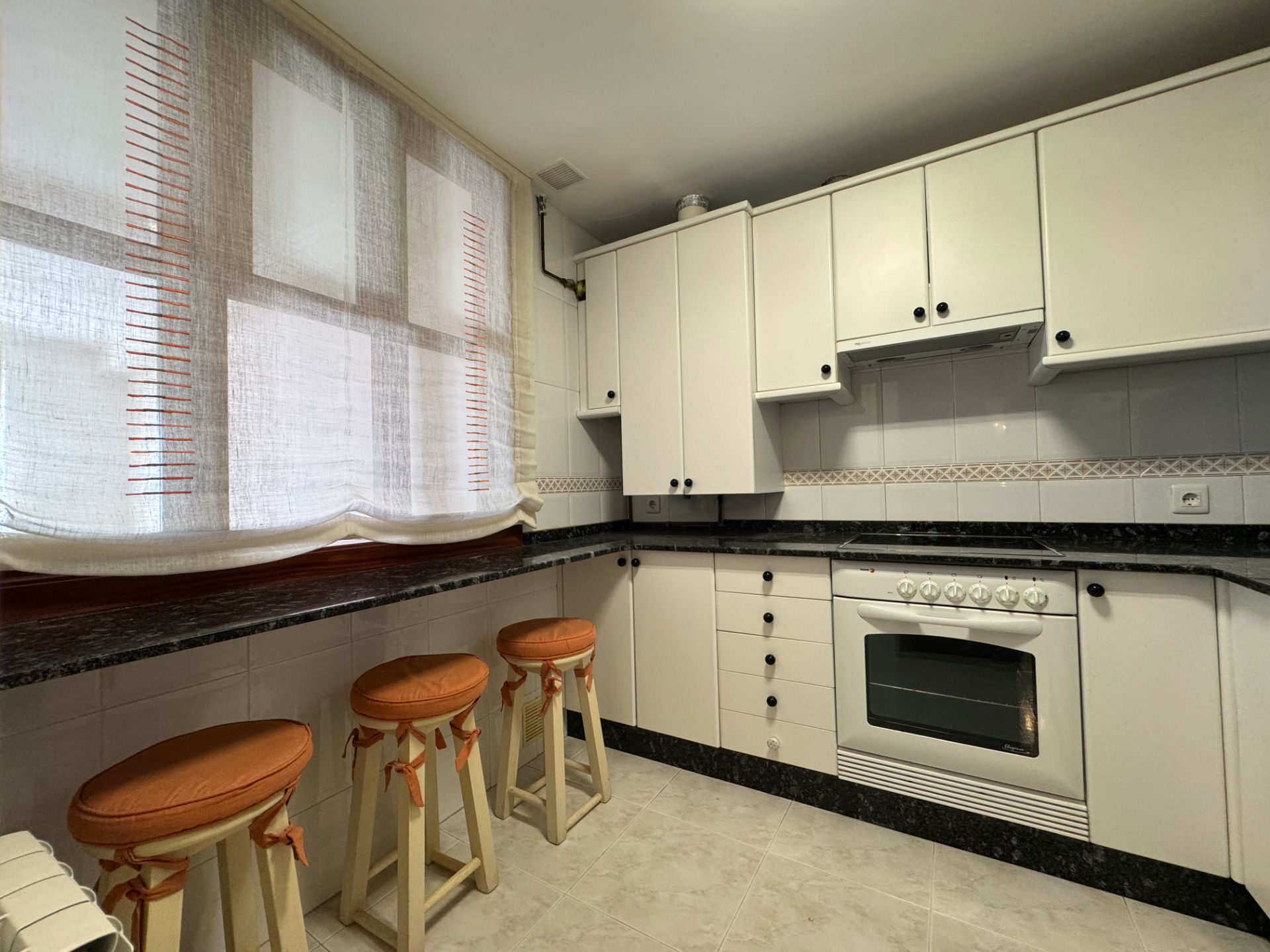 Pis de lloguer a Rúa de Abaixo, O Milladoiro