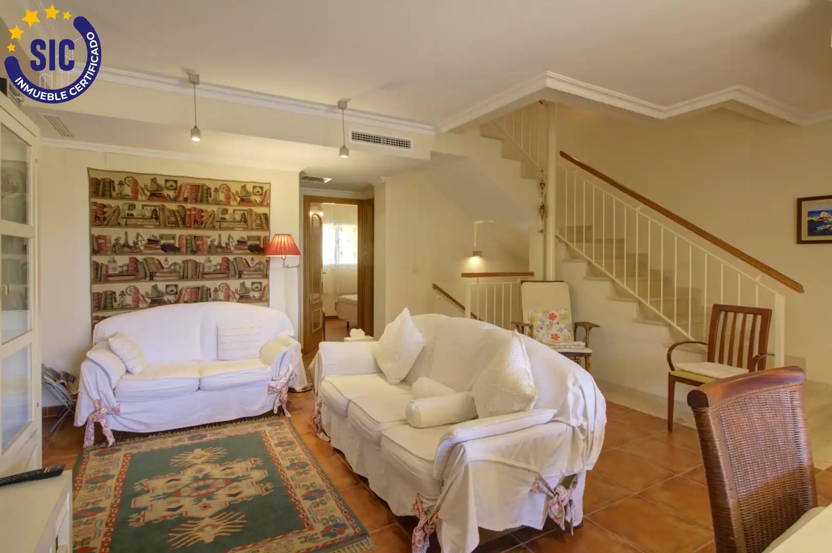 Sala d'estar de Casa adosada en venda en Sagunto / Sagunt amb Aire condicionat, Calefacció i Jardí privat