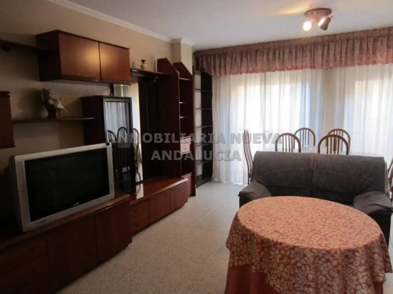 Sala d'estar de Pis de lloguer en Almería amb Aire condicionat i Moblat