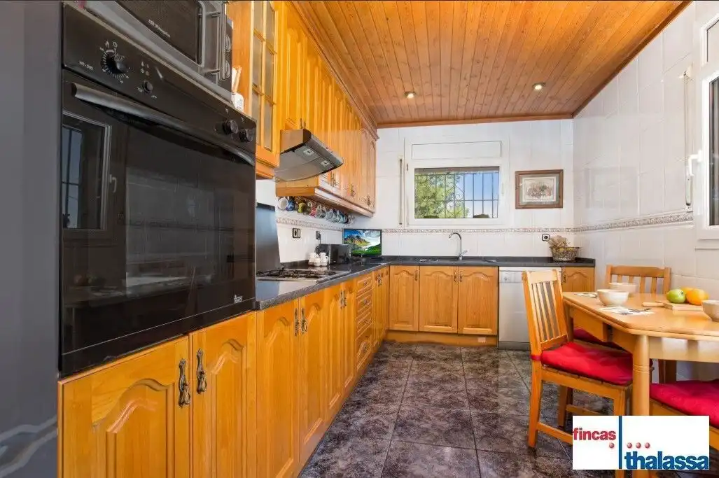 Kitchen of Houses for sale in Lloret de Mar  with Air Conditioner, Private garden and Storage room
