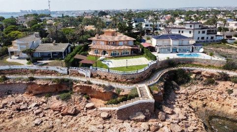 Chalet en venta en Cabo Roig, 8 dormitorios.