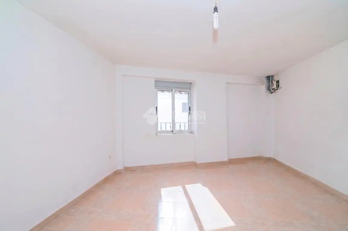 Dormitori de Casa adosada en venda en Loja amb Terrassa